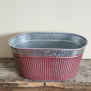Red and Silver Metal Storage Bin